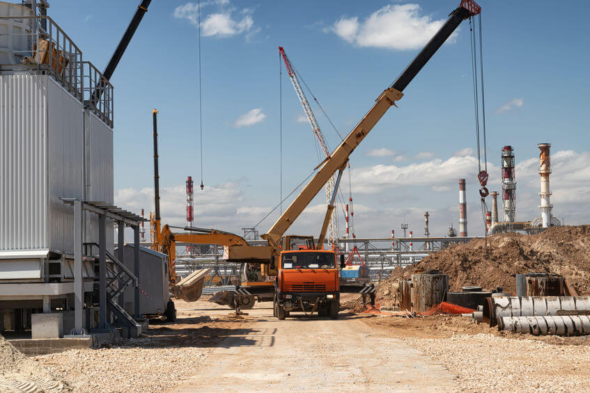 Truck on site at a live oil and gas field.