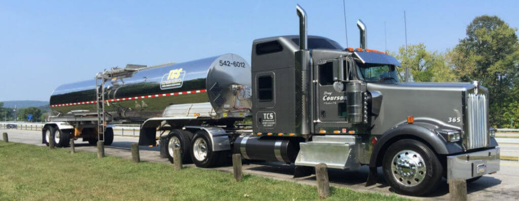 bulk liquid tanker carriers delivering freight on grass